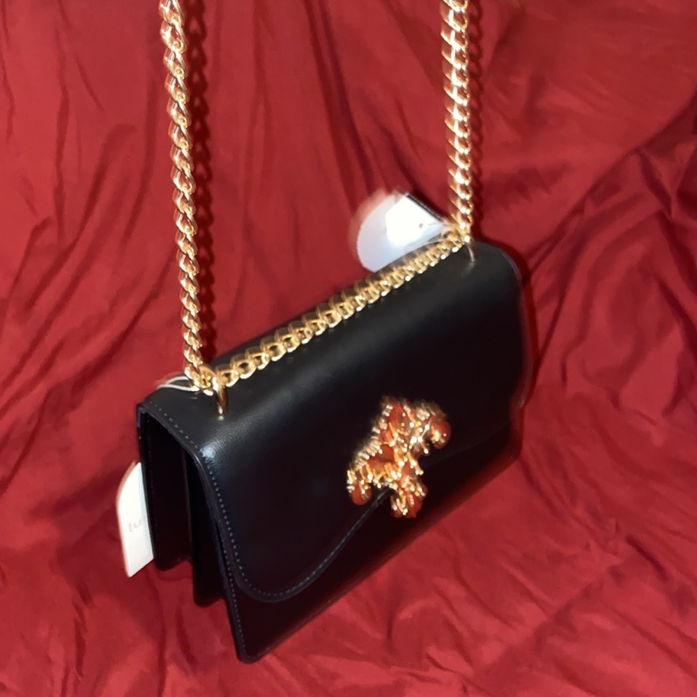 Black, never used crossbody bag.